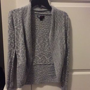 Gray and white sweater.